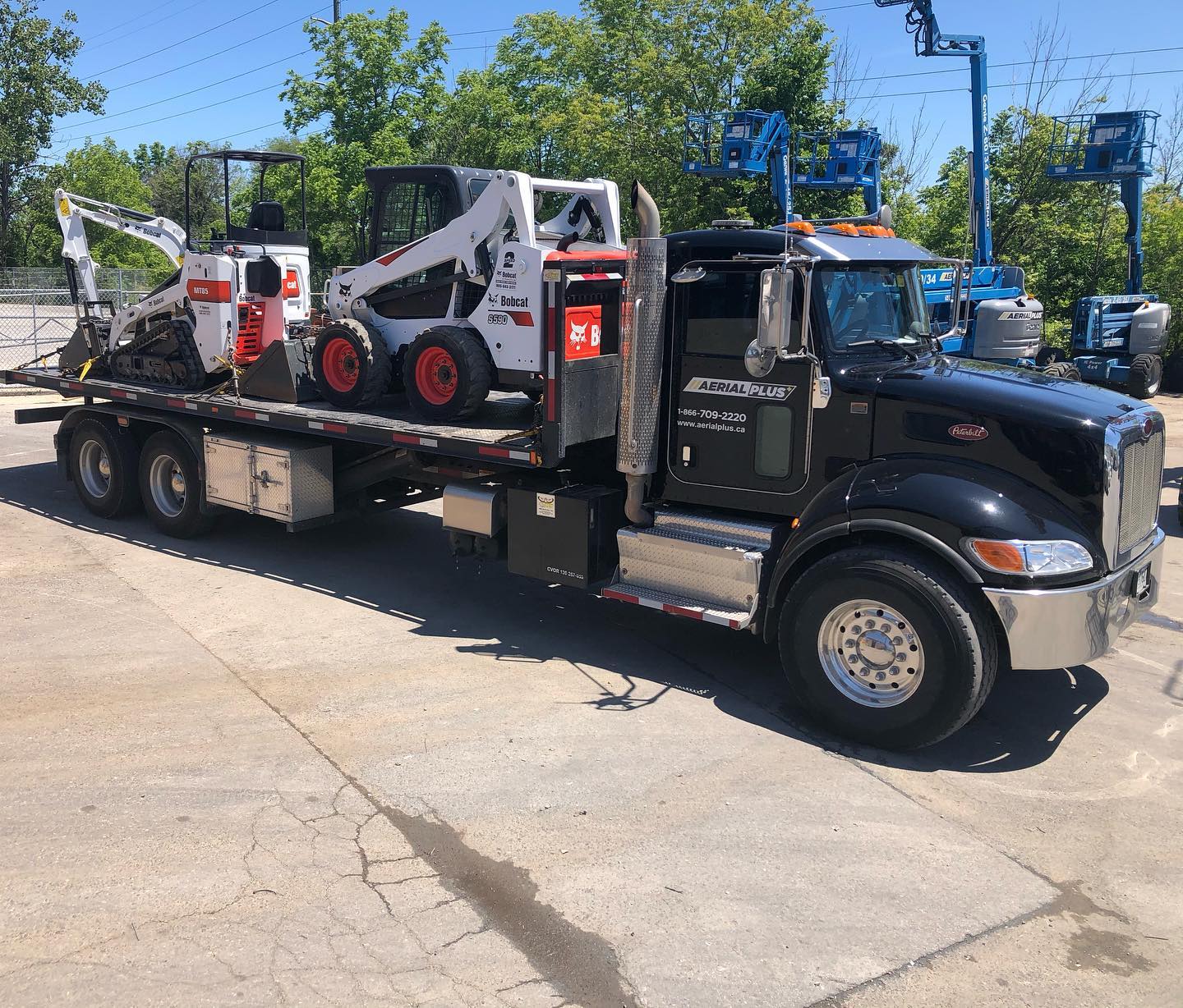 Aerial lift equipment being serviced by Aerial Plus technicians